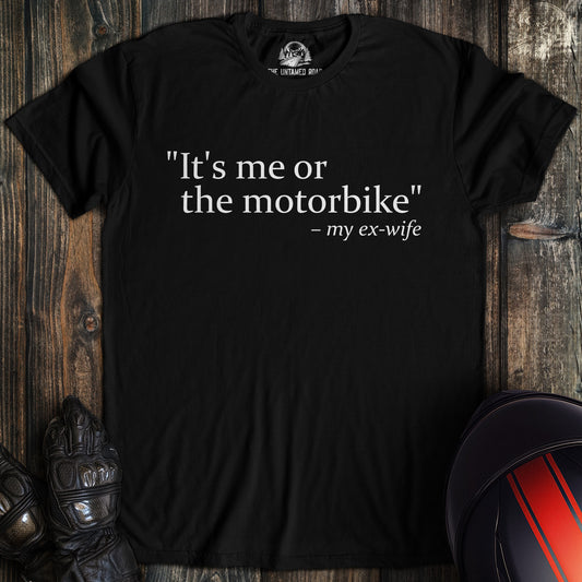 A black colored t-shirt with the words "me or motorbike" printed on the front.