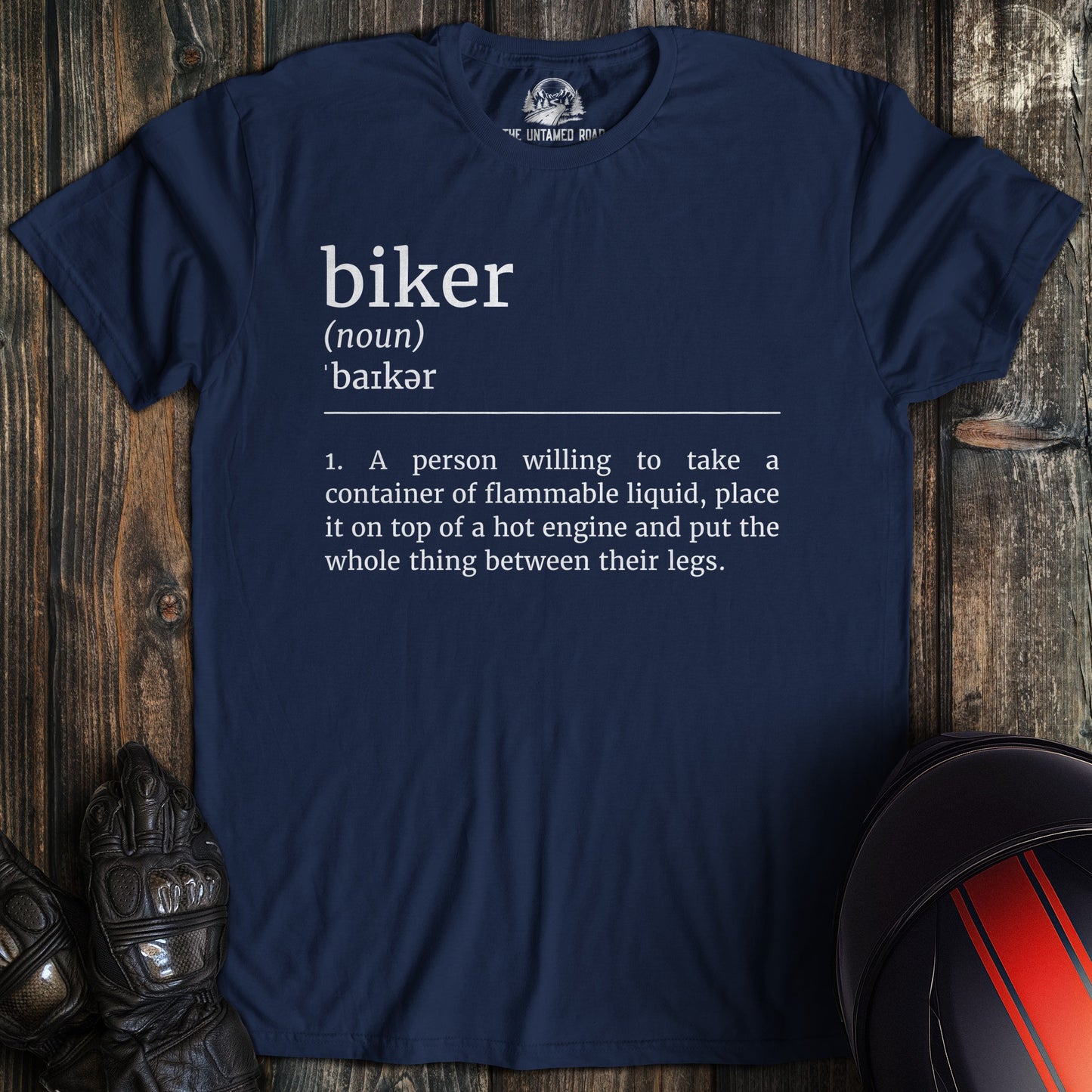 A navy colored t-shirt with the words "biker definition" printed on the front.