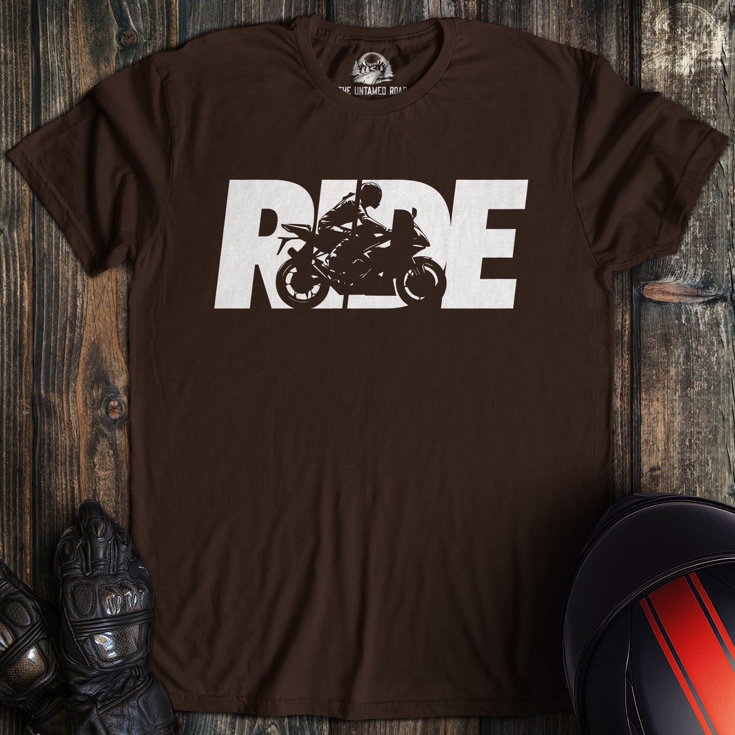 A dark chocolate colored t-shirt with the words "ride silhouette sportbike" printed on the front.