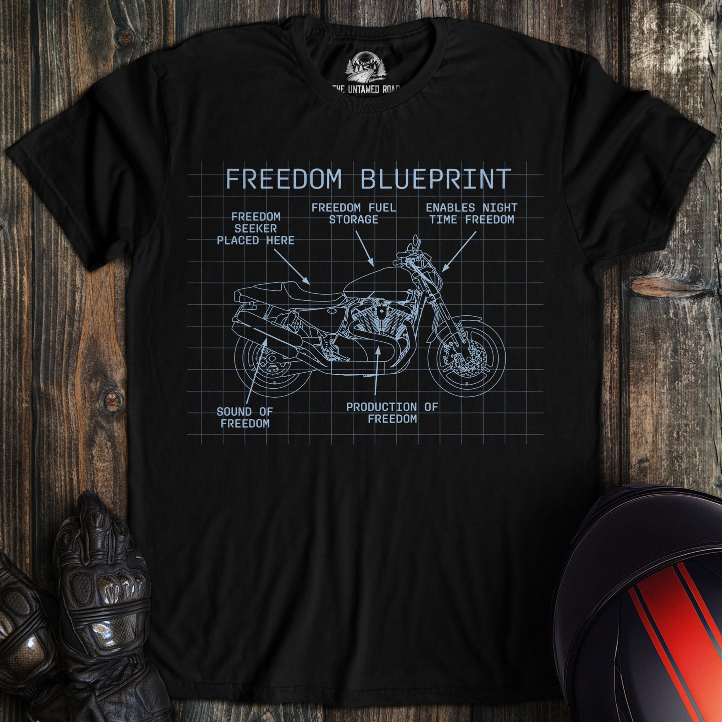 A black colored t-shirt with the words "freedom blueprint" printed on the front.