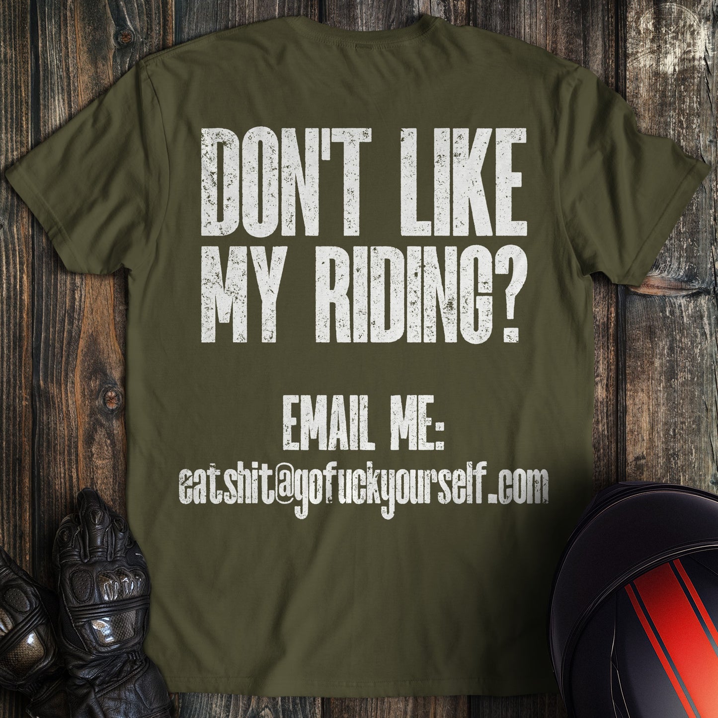 A military green colored t-shirt with the words "dont like riding email" printed on the back.