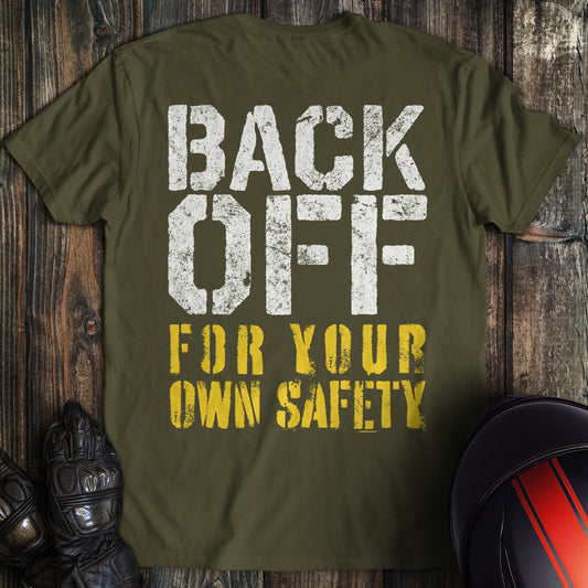 A military green colored t-shirt with the words "back off for your safety" printed on the back.