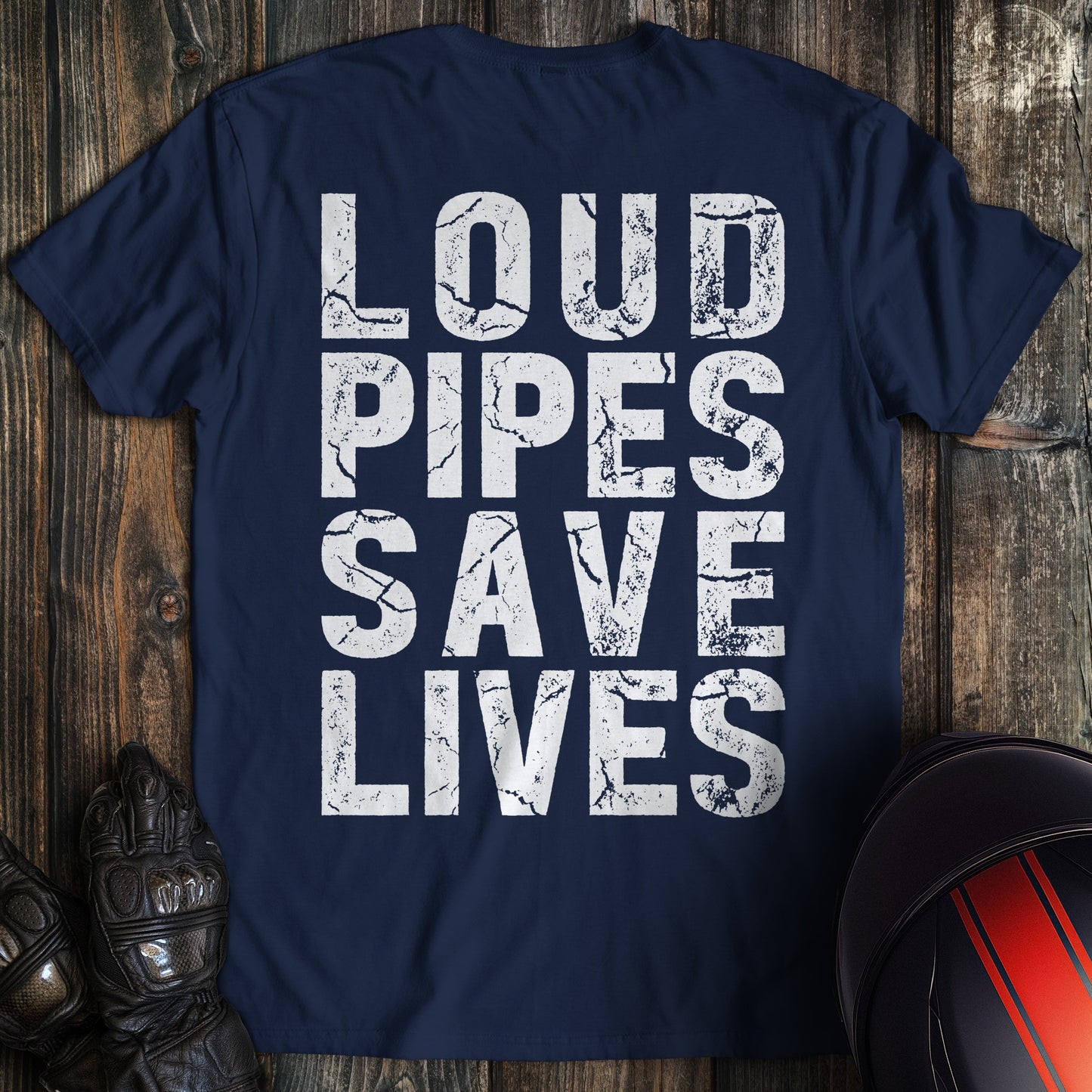 A navy blue biker t-shirt featuring the words LOUD PIPES SAVE LIVES in a distressed white block font.