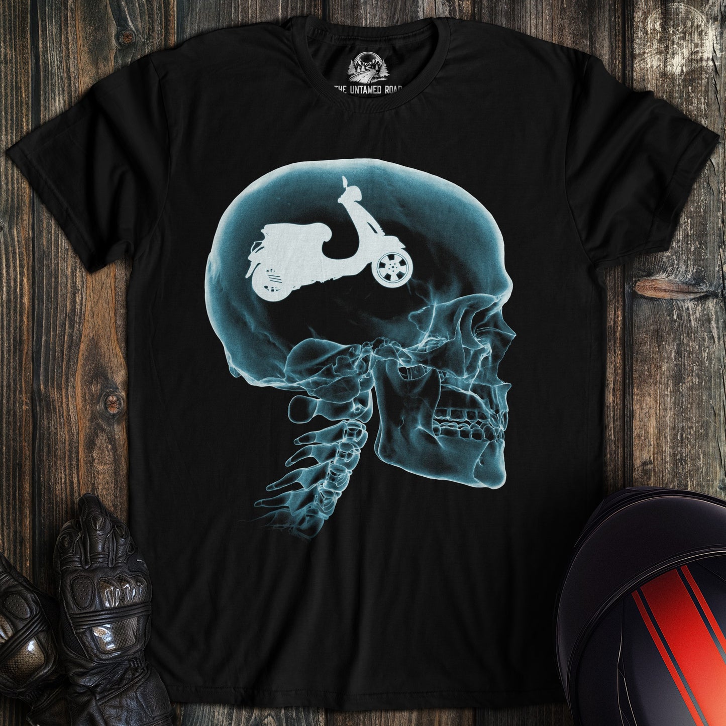 A black colored t-shirt with the words "head xray scooter" printed on the front.