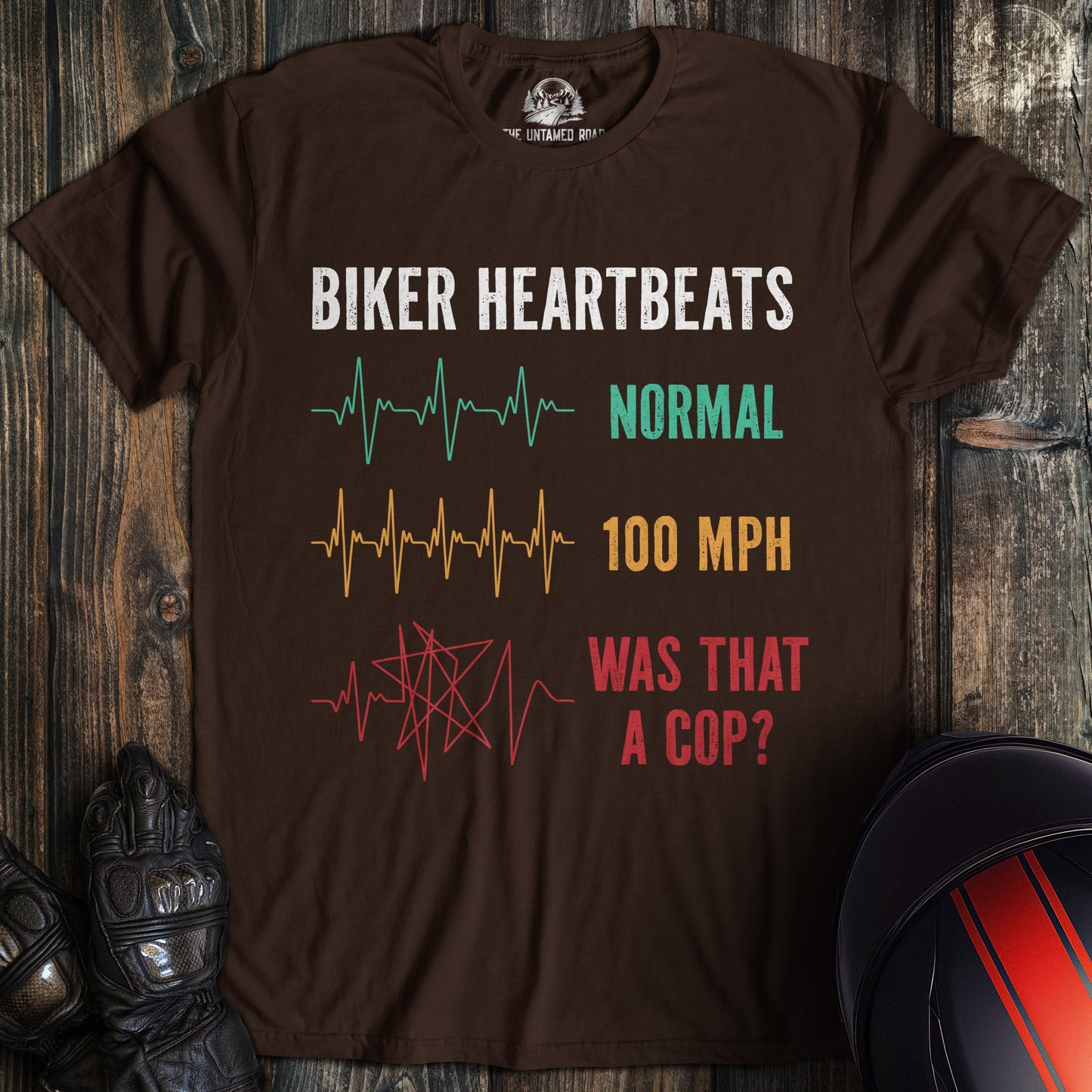 A dark brown biker t-shirt featuring funny heartbeat lines for normal, 100 mph, and 'Was that a cop?'