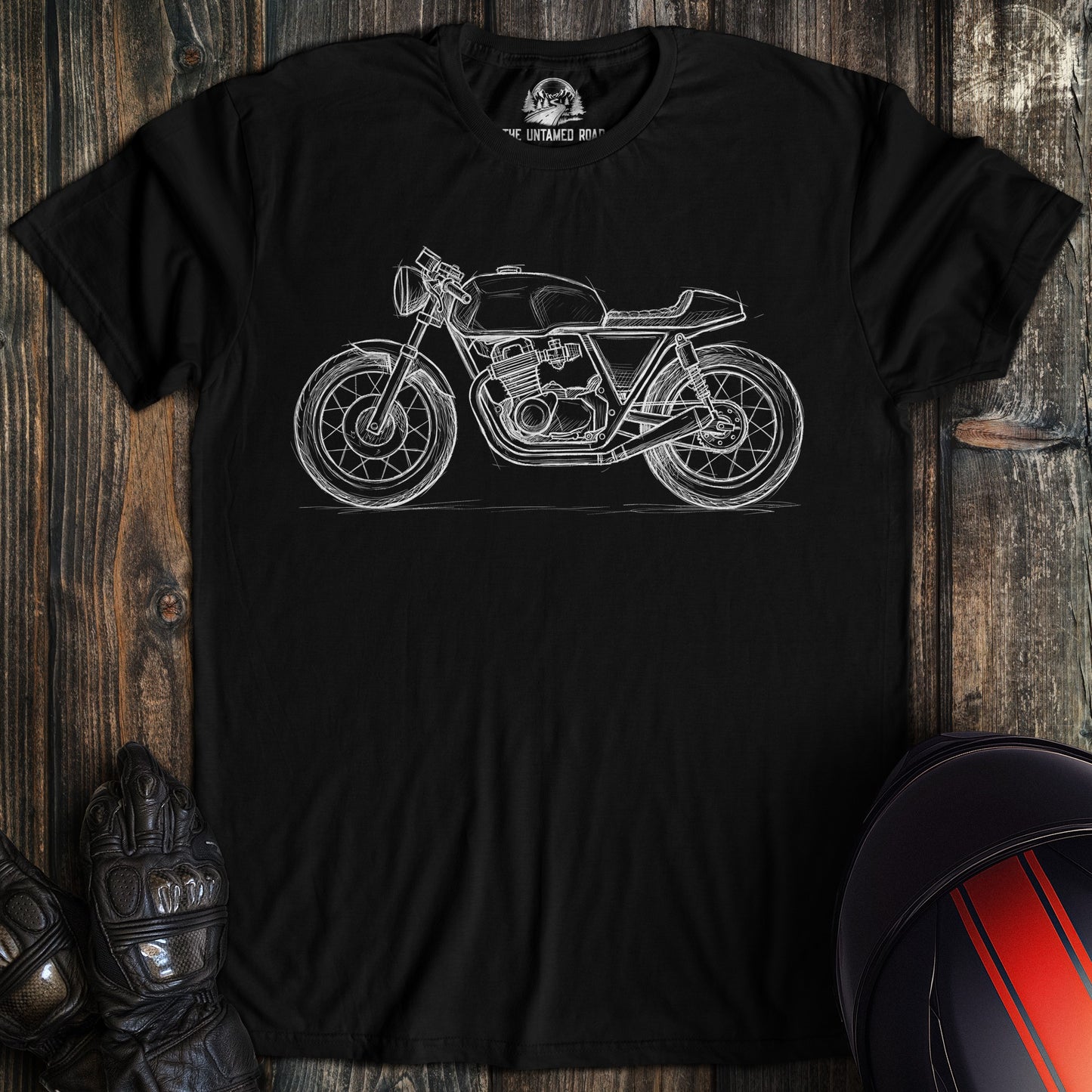 A black colored t-shirt with the words "cafe racer sketch" printed on the front.
