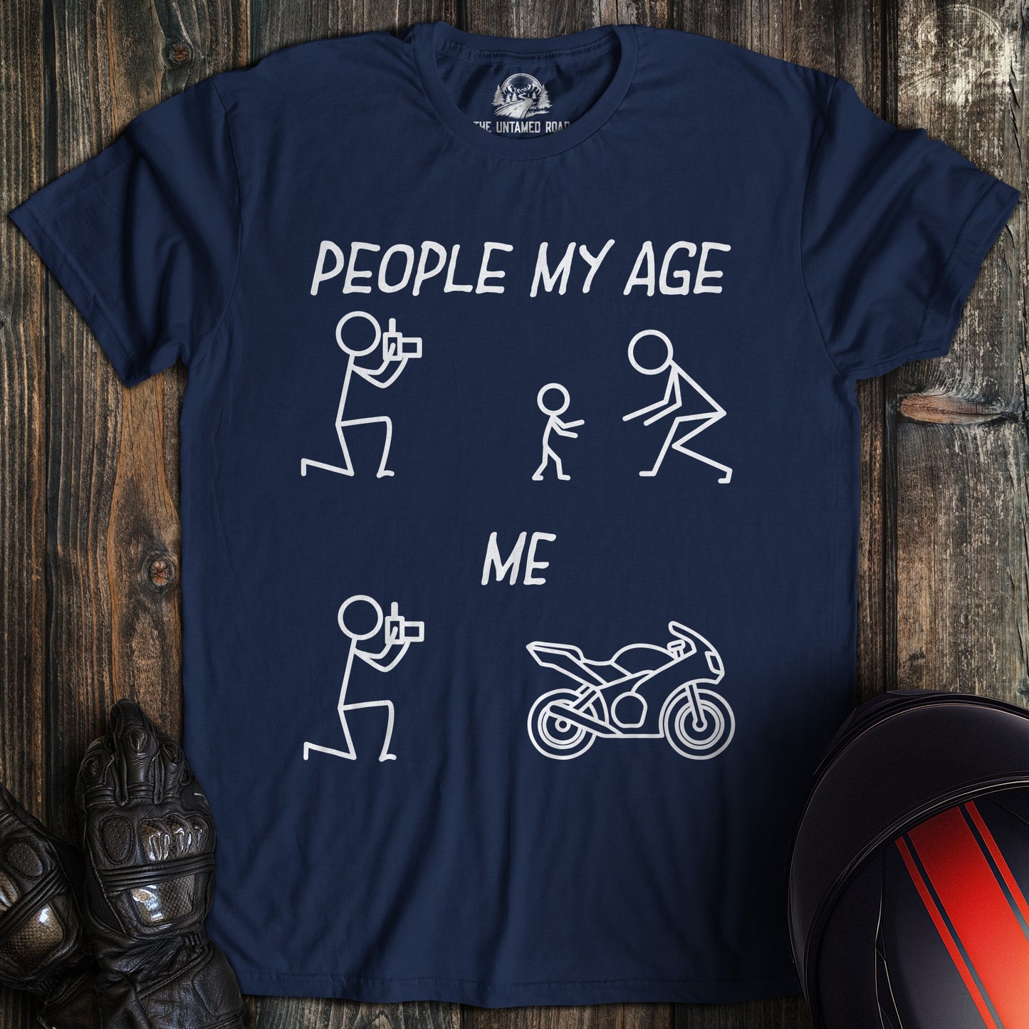 A navy blue t-shirt featuring a funny biker graphic comparing people with families to a person with a motorcycle.