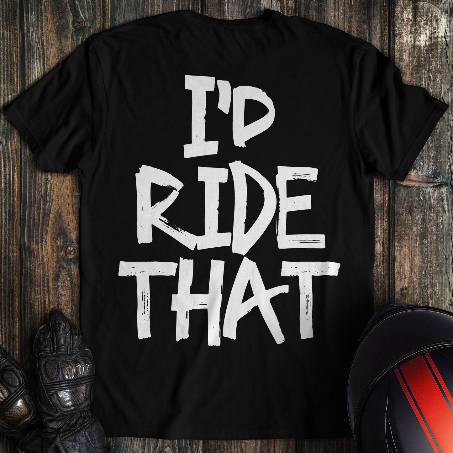 A black t-shirt featuring the phrase I'D RIDE THAT in a white, distressed paint-stroke font.