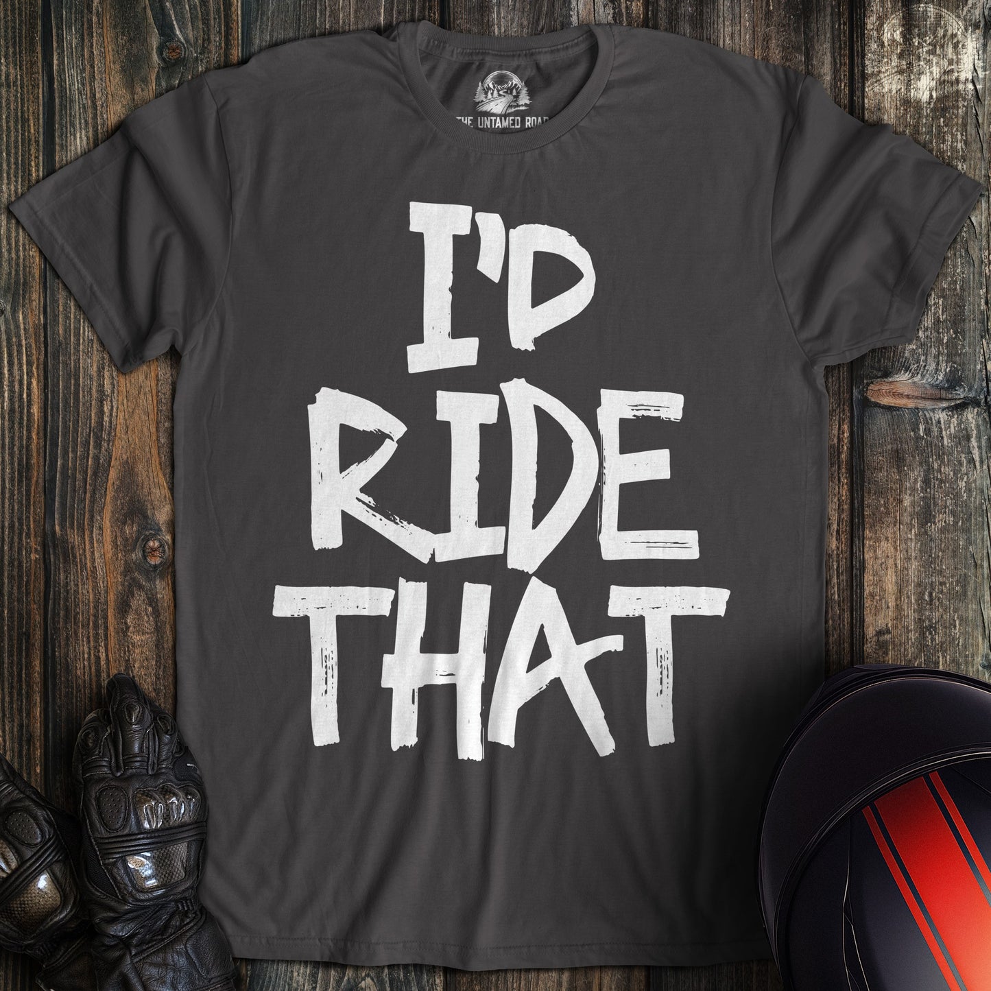 A charcoal gray t-shirt featuring the text I'D RIDE THAT in a white, distressed paint-stroke font.
