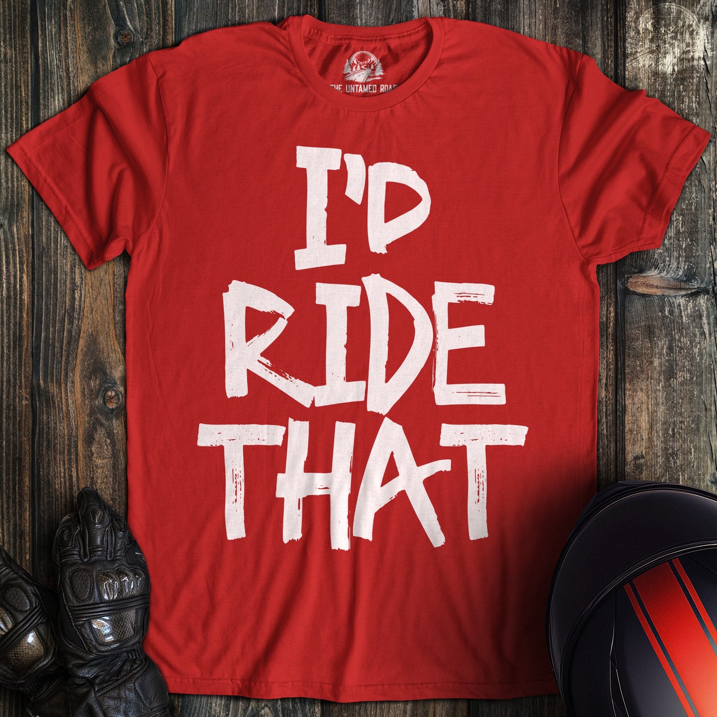 A red t-shirt featuring the phrase I'D RIDE THAT in a white, distressed paint-style font.