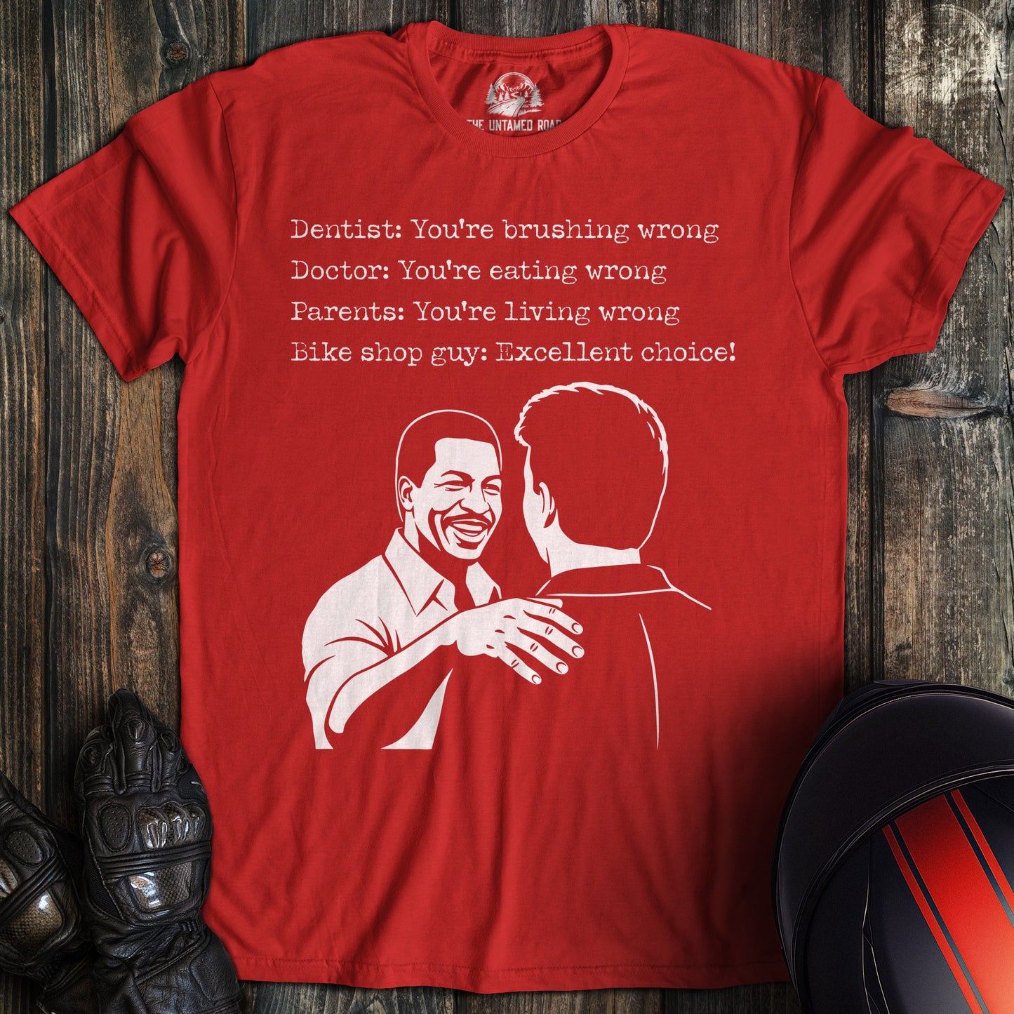 A red t-shirt featuring a funny biker graphic and text about a bike shop guy saying, "Excellent choice!"