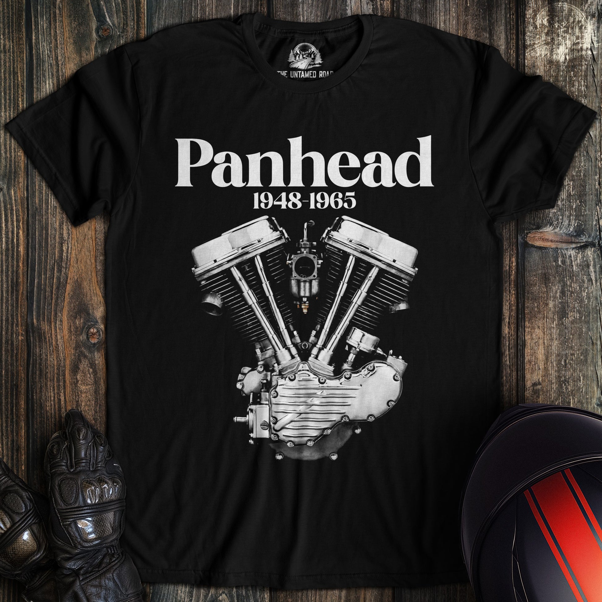 A black t-shirt featuring a white graphic of a Panhead motorcycle engine with the text Panhead 1948-1965.