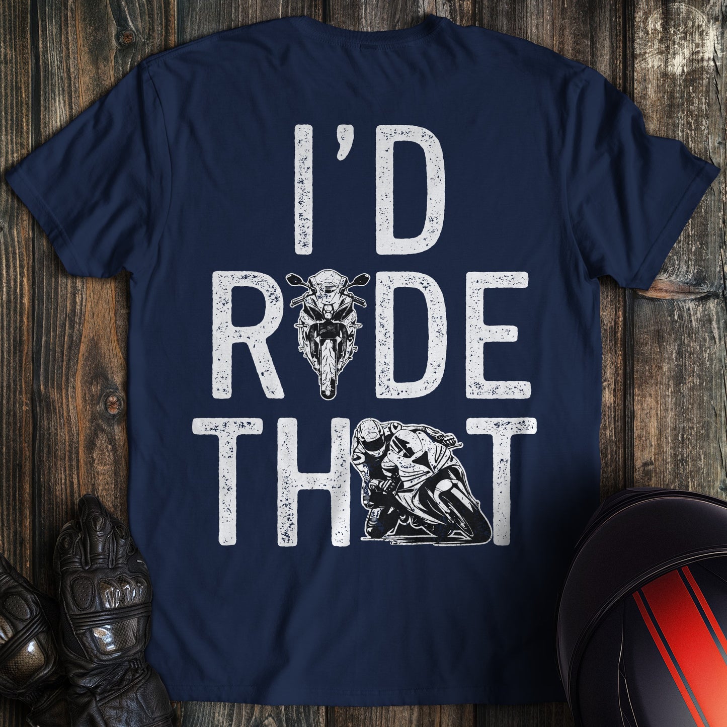 A navy blue t-shirt with distressed white text reading I'D RIDE THAT featuring motorcycle and biker graphics.