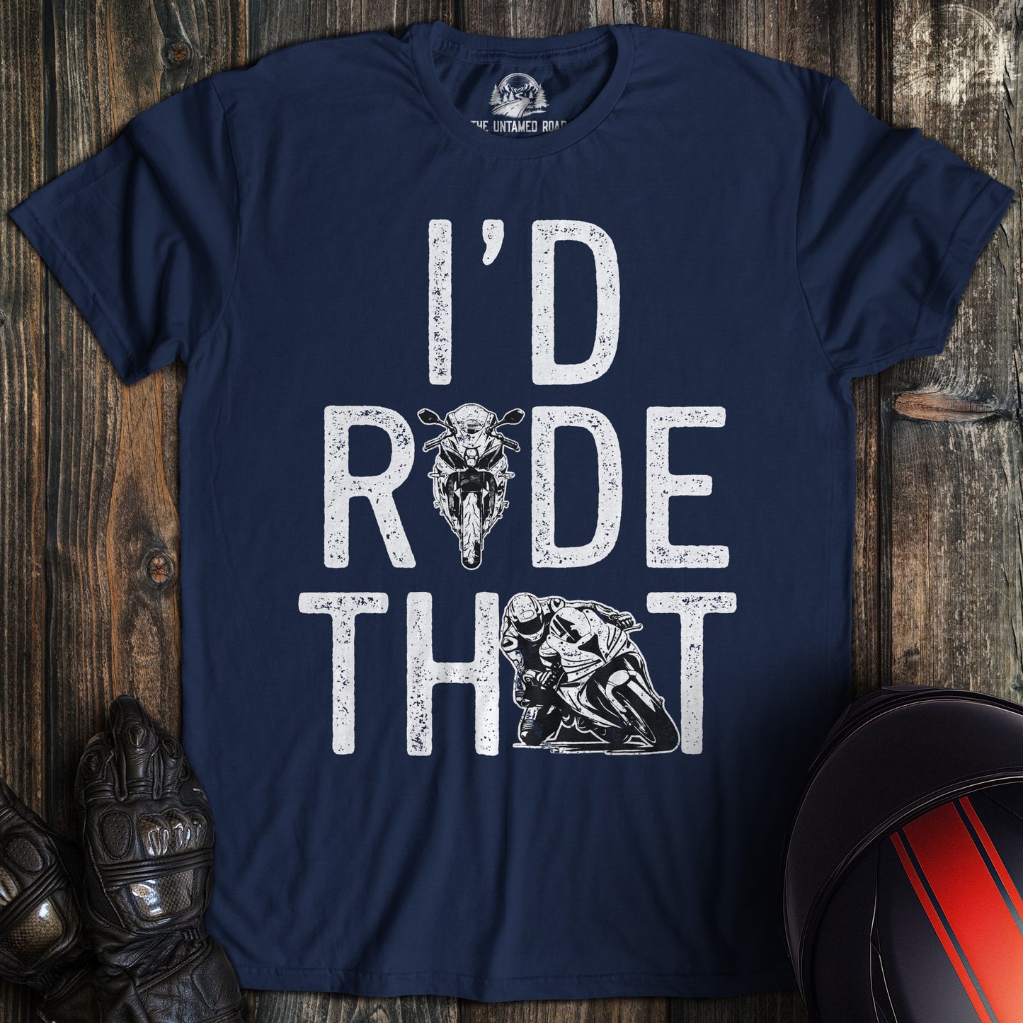 A navy blue t-shirt with white distressed text reading I'D RIDE THAT featuring motorcycle and biker graphics.