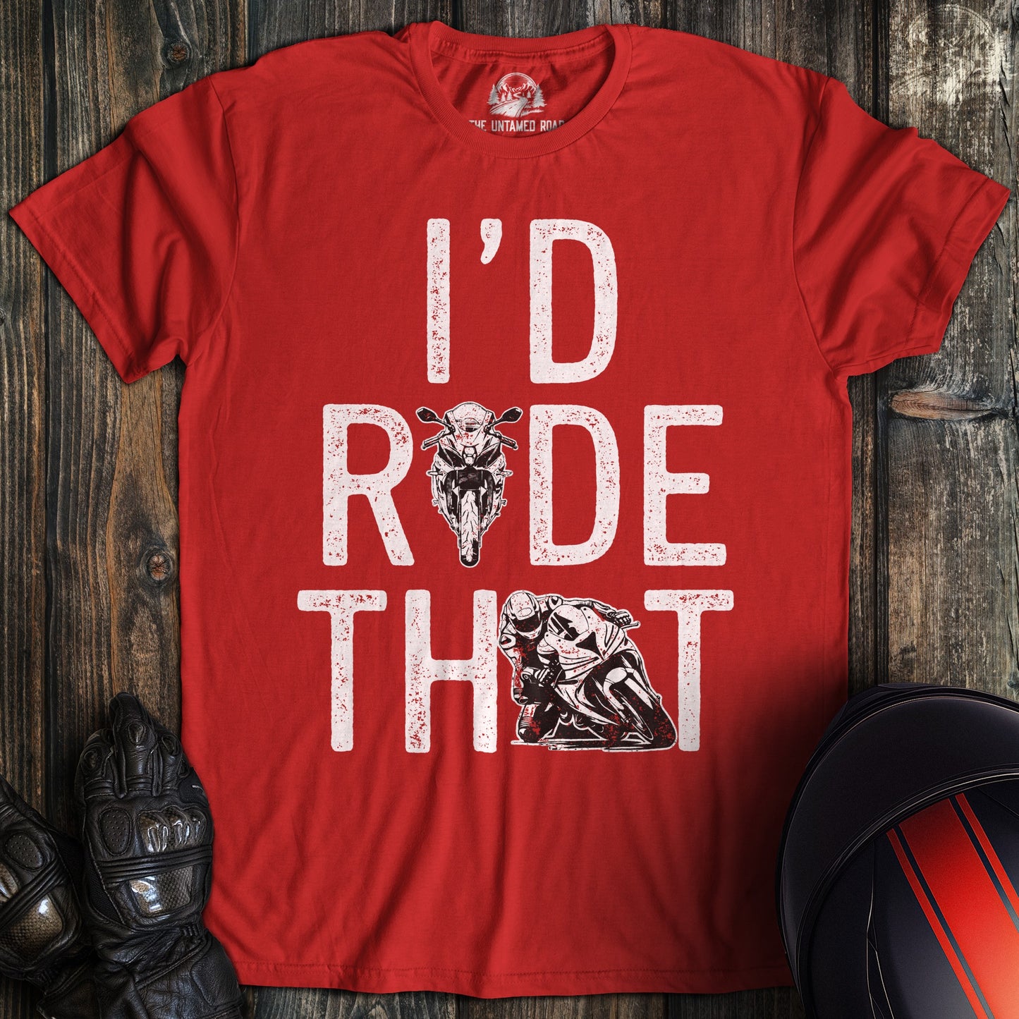 A red t-shirt featuring the text I'D RIDE THAT in white distressed font with motorcycle graphics.