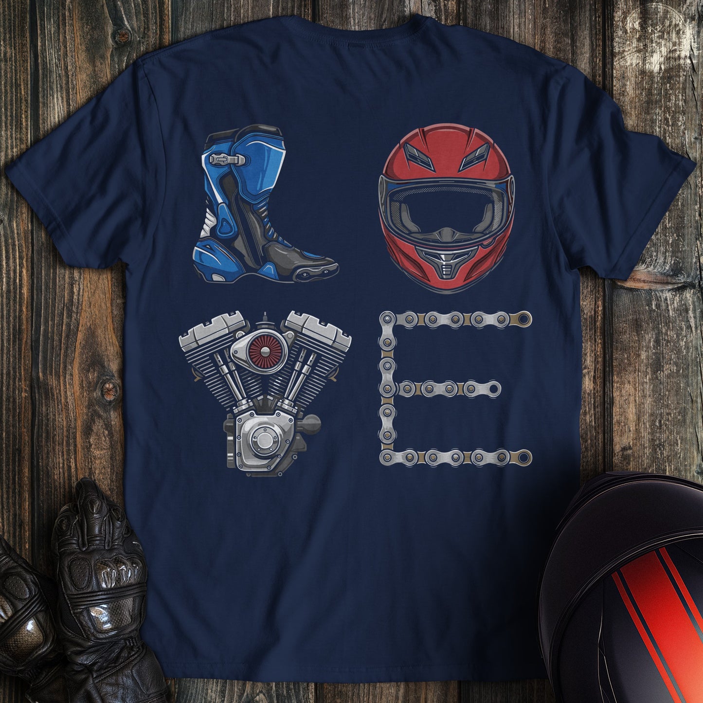 Navy blue t-shirt with biker graphics spelling LOVE using a motorcycle boot, helmet, engine, and chain.