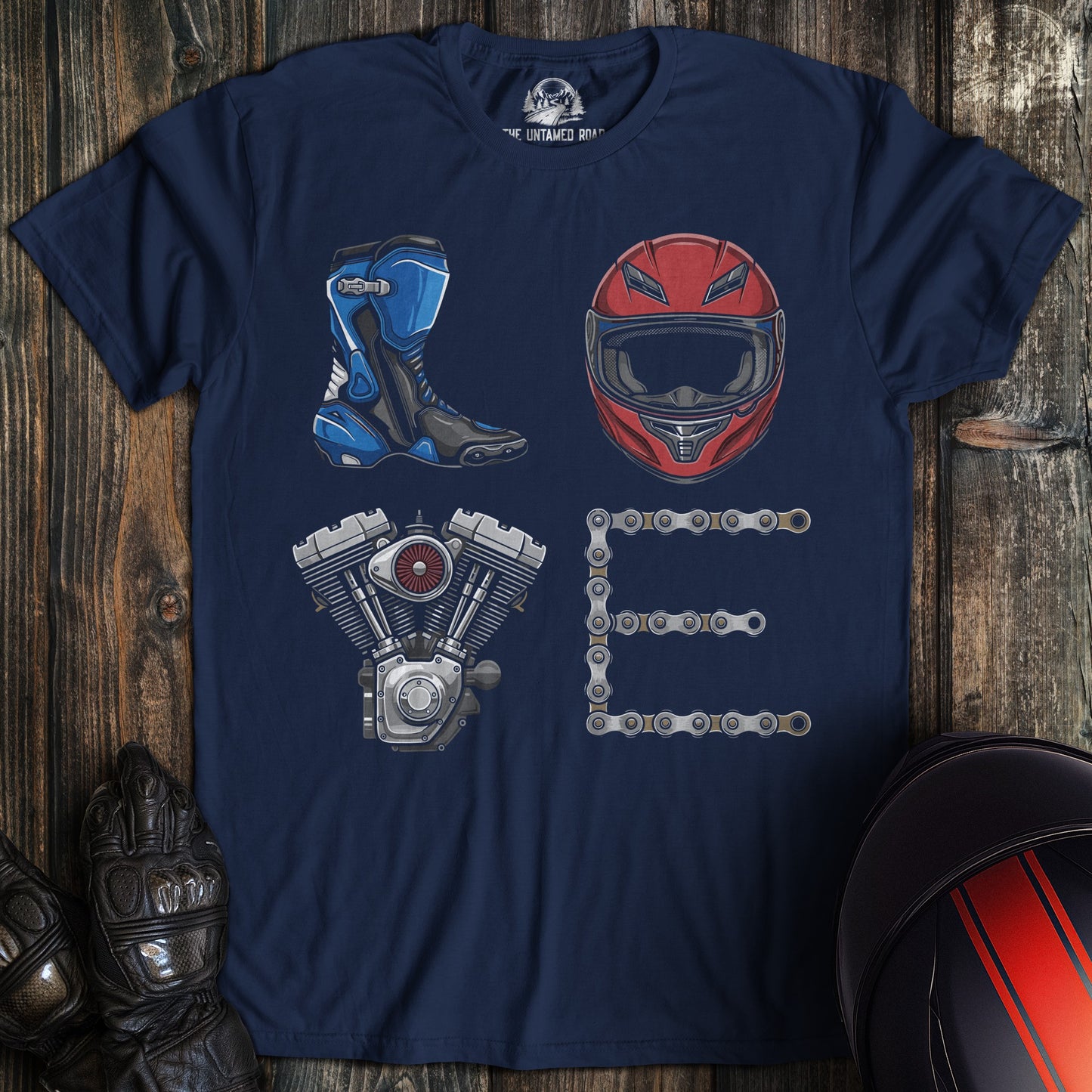 A navy blue t-shirt featuring motorcycle gear and parts arranged to spell the word LOVE.