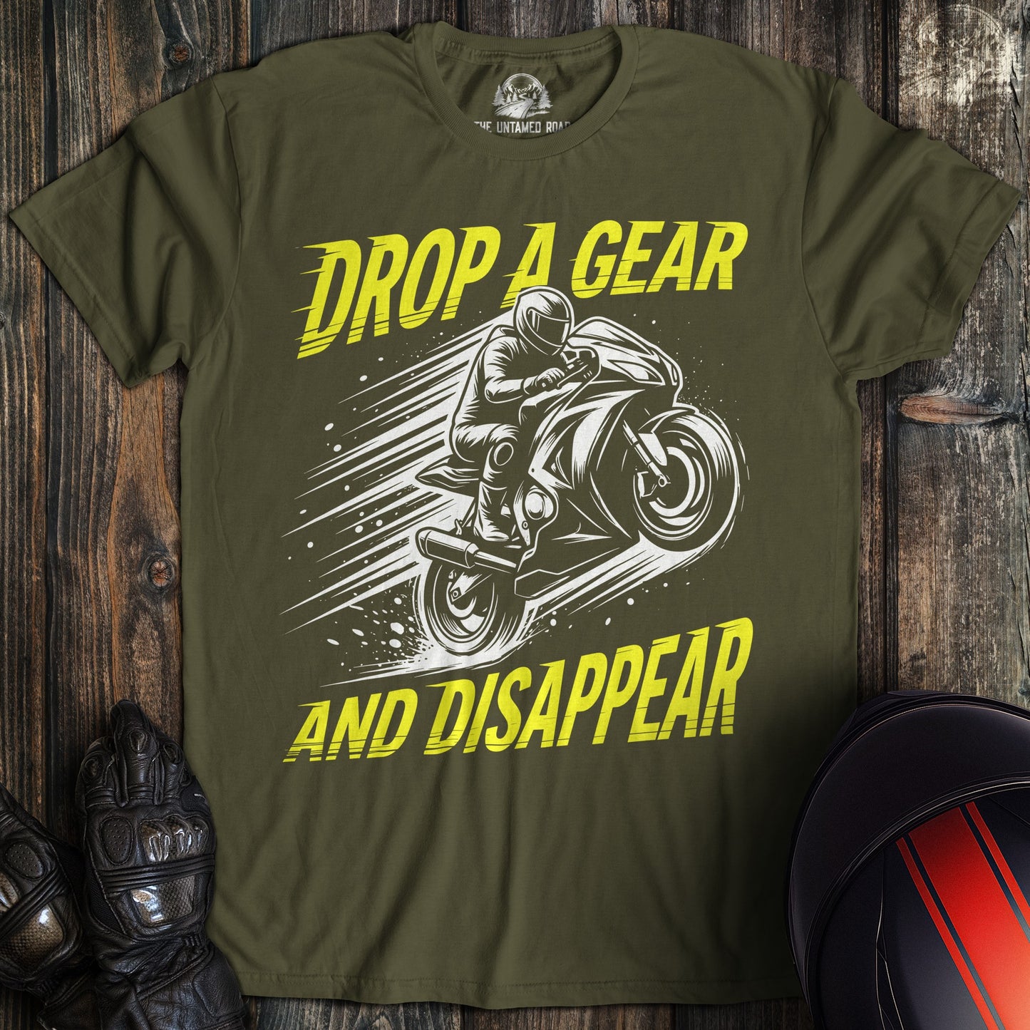 A military green t-shirt featuring a motorcycle graphic with the text Drop A Gear And Disappear in yellow.