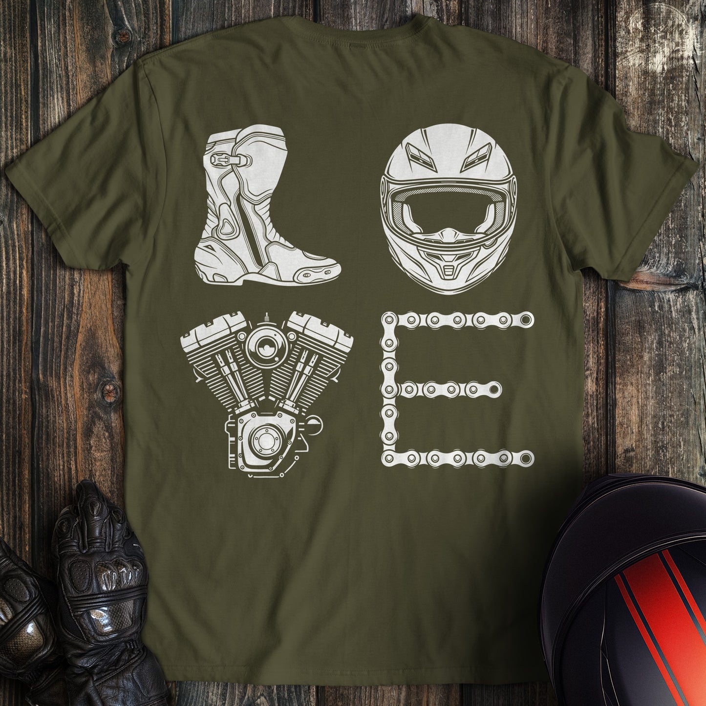Military green t-shirt with white motorcycle gear graphics spelling LOVE using a boot, helmet, engine, and chain.