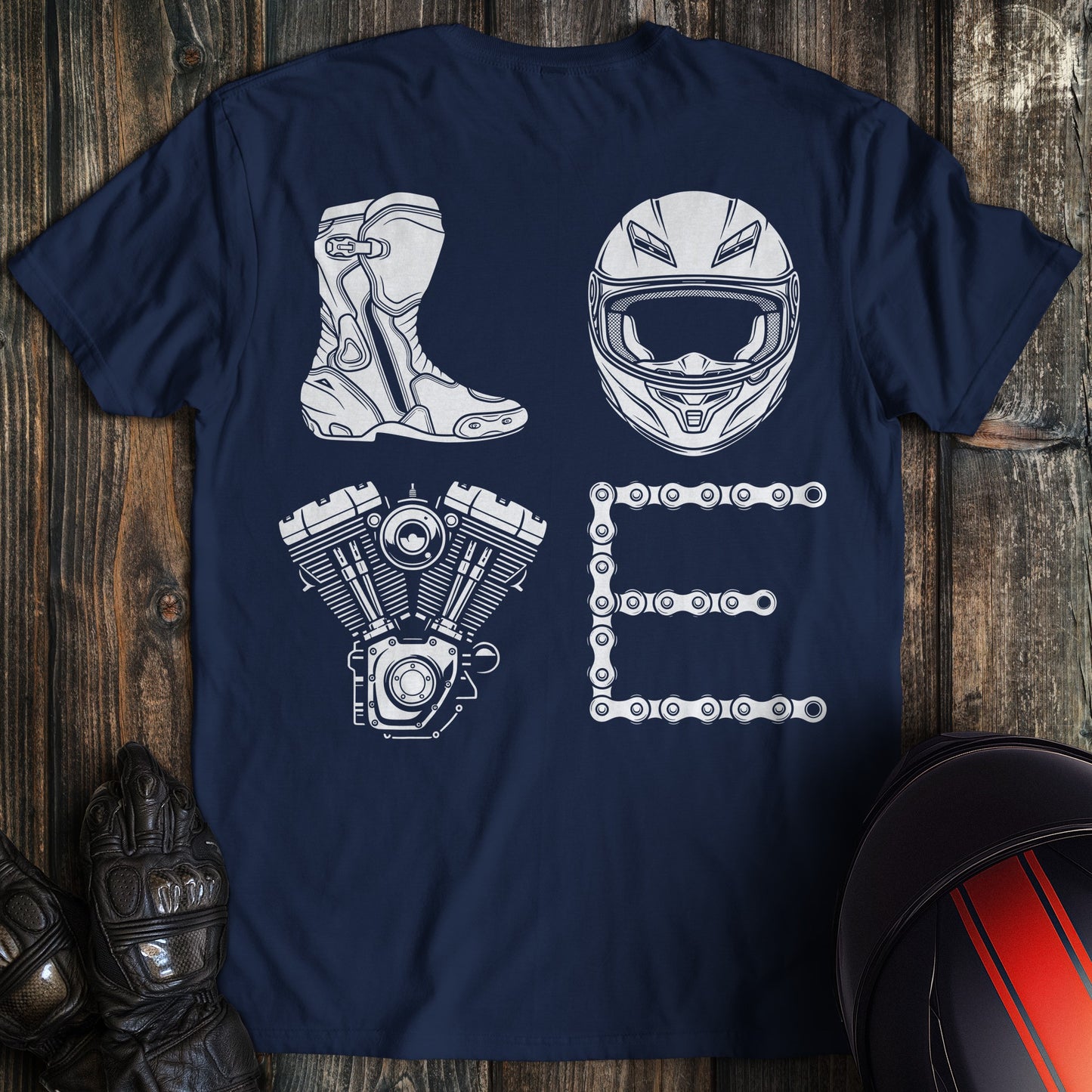 A navy blue t-shirt featuring white motorcycle icons of a boot, helmet, engine, and chain spelling the word LOVE.