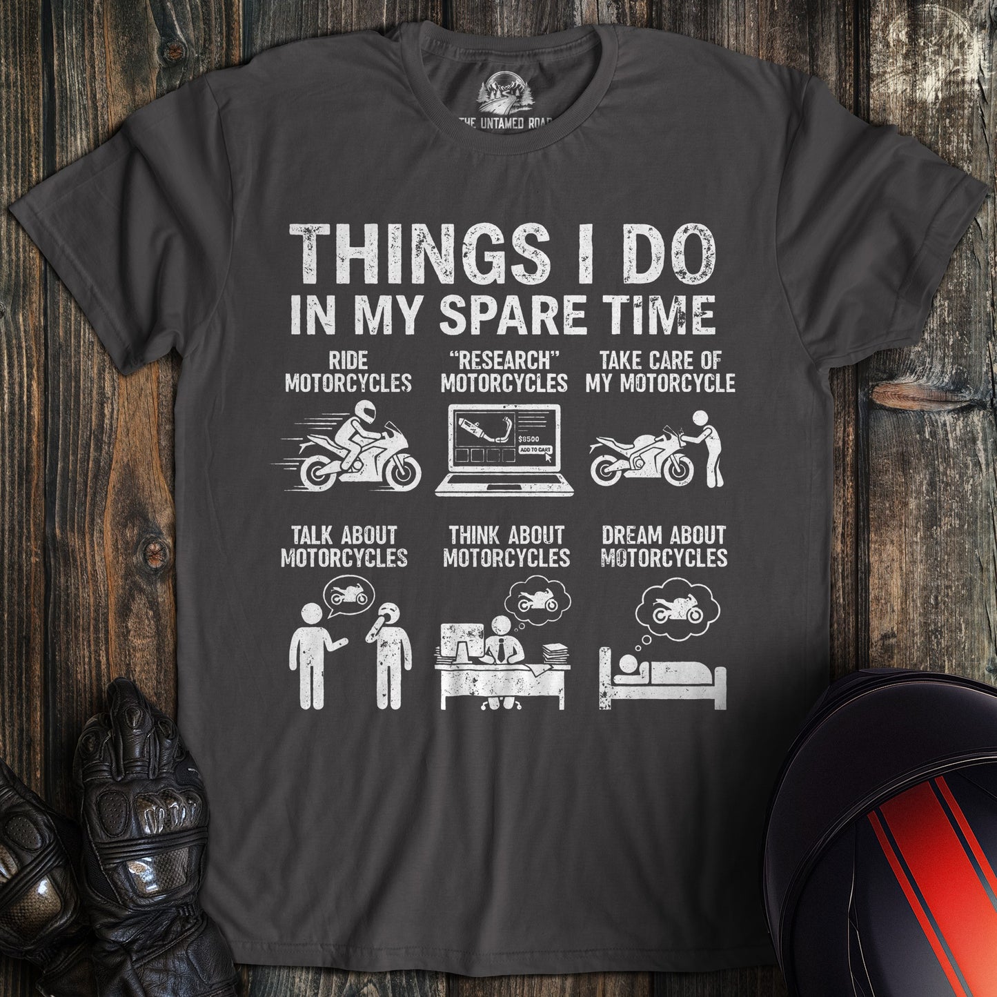 A charcoal gray t-shirt featuring a funny graphic titled Things I Do In My Spare Time with motorcycle themed illustrations.